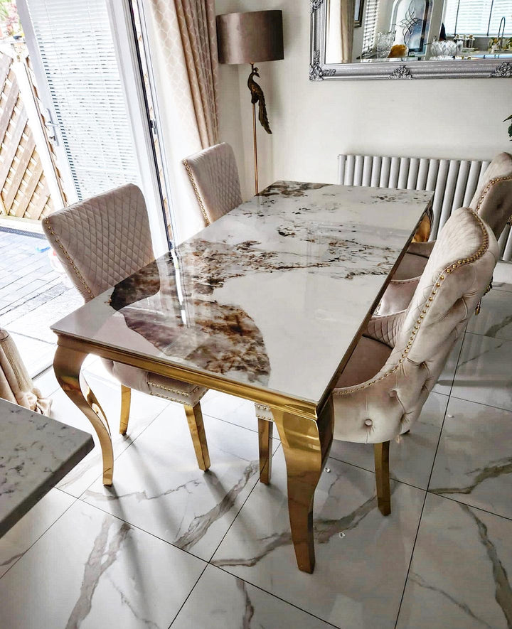 Louis Gold Marble Dining Table With Shimmer Cream Gold Lion Knocker Dining Chairs - Belmont Interiors